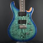 PRS SE “Exotic”  Custom 24 Swamp Ash Burl Lake Blue #934